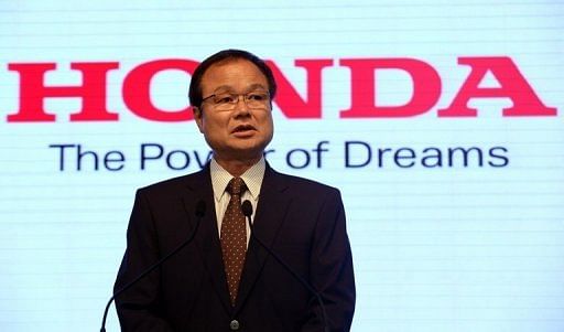 Honda Motors president Takanobu Ito delivers a speech at the automaker&#039;s headquarters in Tokyo, on May 16, 2013