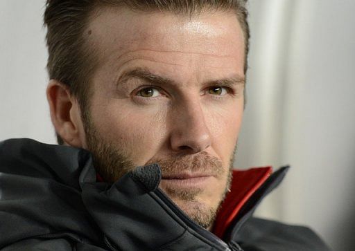 David Beckham looks on during PSG&#039;s league match against Montpellier on March 29, 2013