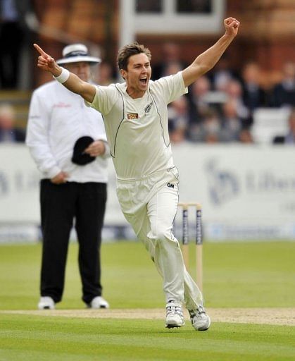 New Zealand&#039;s Trent Boult celebrates the wicket of England&#039;s Jonathan Trott at Lord&#039;s on May 16, 2013