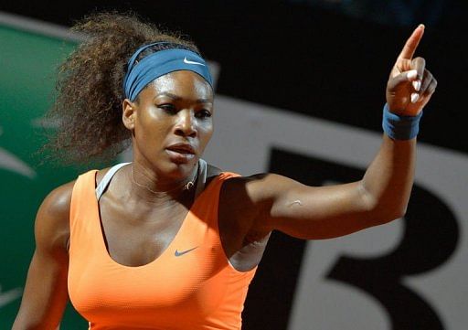 Serena Williams celebrates her victory at the Foro Italico in Rome, on May 14, 2013