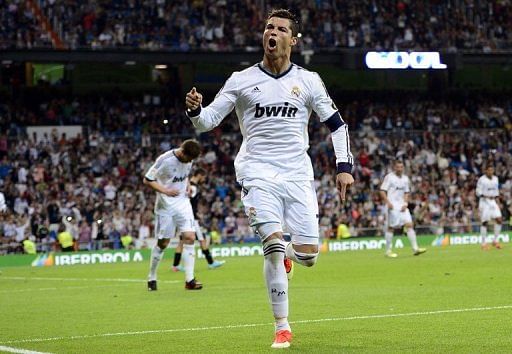Real Madrid forward Cristiano Ronaldo celebrates after scoring during their match against Malaga on May 8, 2013