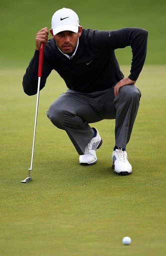 Charl Schwartzel lines up a putt during the first round of the 2013 HP Byron Nelson Championship, May 16, 2013