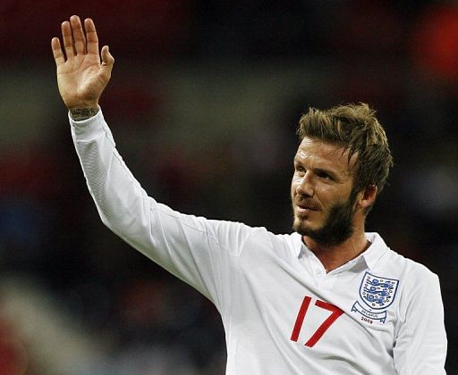 David Beckham waves after England beat Belarus at Wembley on October 14, 2009