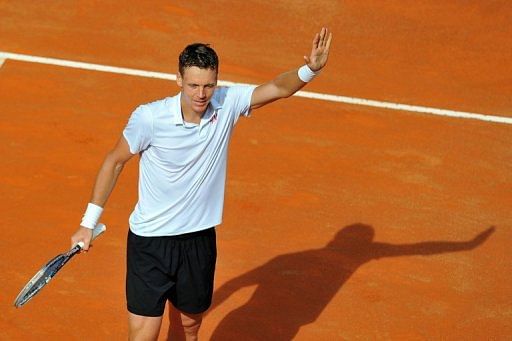 Tomas Berdych celebrates after defeating Novak Djokovic in the Rome Masters on  May 17, 2013
