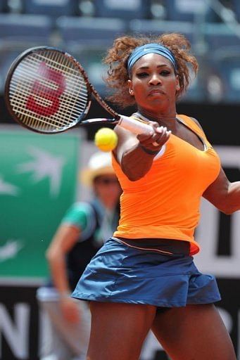 American Serena Williams returns a ball to Spanish Carla Suarez Navarro on May 17, 2013 at the Rome Masters