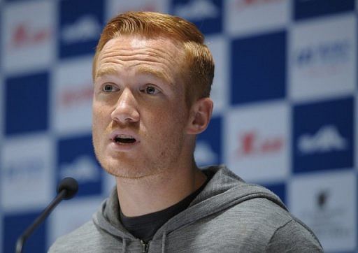 British long jump Olympic champion Greg Rutherford speaks in Shanghai on May 16, 2013