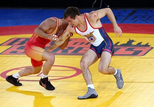 Reece Humphrey tries to take down Masoud Esmailpour Jouybari during the Rumble on the Rails on May 15, 2013 in New York City