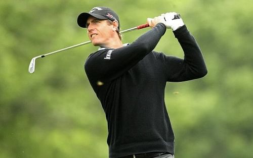 Nicolas Colsaerts of Belgium hits a tee shot on May 2, 2013 in Charlotte, North Carolina