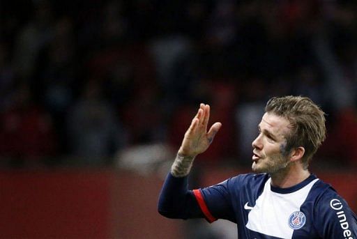 Tearful Beckham bids farewell to Paris