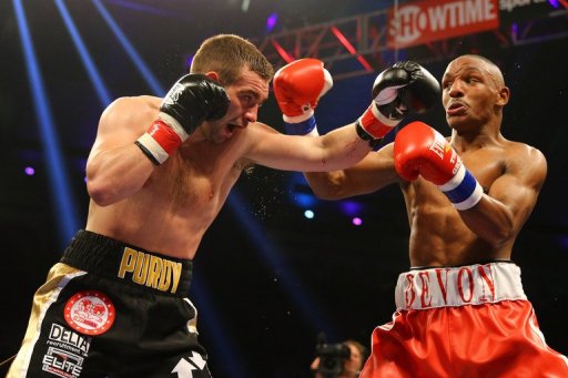 Devon Alexander (R) and Lee Purdy face off at their IBF Welterweight Title fight May 18, 2013 in Atlantic City