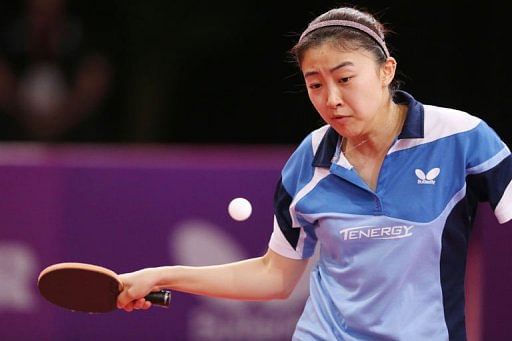 Spain&#039;s Yanfei Shen plays against Turkey&#039;s Melek Hu on May 17, 2013 in Paris during the World Table Tennis Championships