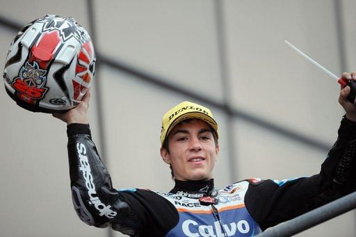 Spanish Maverick Vinales celebrates after winning the French Moto3 race at Le Mans circuit, France on May 19, 2013