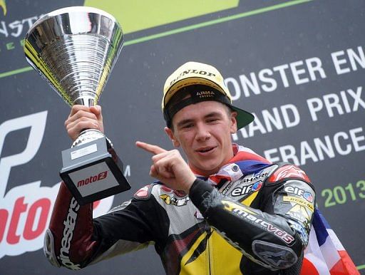 Briton Scott Redding celebrates after winning the French Moto2 Grand Prix in Le Mans, France on May 19, 2013