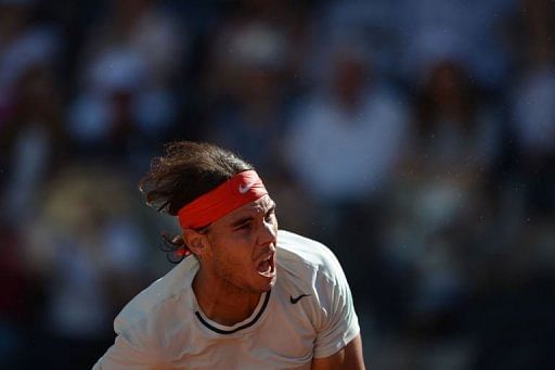 Spain&#039;s Rafael Nadal returns to Switzerland&#039;s Roger Federer during the final of the ATP Rome Masters on May 19, 2013