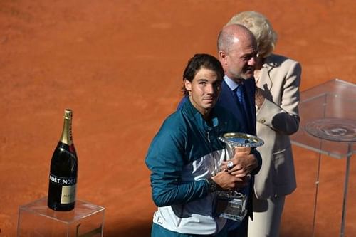 Rafael Nadal celebrates with the cup during the trophy ceremony of the ATP Rome Masters on May 19, 2013