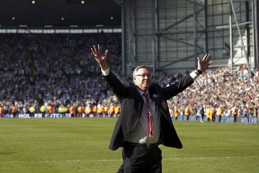 Alex Ferguson acknowledges fans in West Bromwich on May 19, 2013