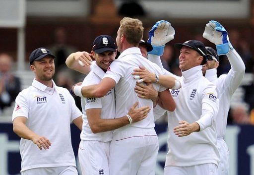 England's players celebrate dismissing Brendon McCullum lbw for 8 at Lord's on May 19, 2013