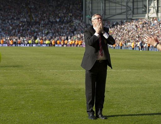 Alex Ferguson acknowledges fans at The Hawthorns in West Bromwich, on May 19, 2013
