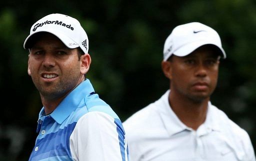 Tiger Woods (R) and Sergio Garcia during The Players Championship at TPC Sawgrass in Florida, May 11, 2013