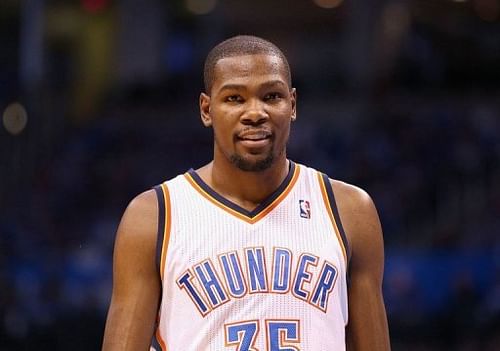 Kevin Durant of the Oklahoma City Thunder smiles as he walks up court at Chesapeake Energy Arena on April 21, 2013