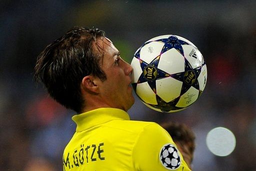 Borussia Dortmund&#039;s Mario Goetze controls the ball during the Champions League match against Malaga on April 3, 2013