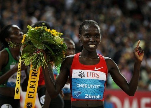 Kenya&#039;s Vivian Cheruiyot reacts after winning the 5000m Women&#039;s Race on September 8, 2011, in Zurich