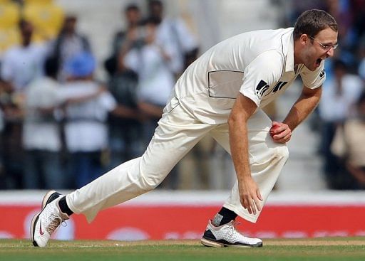 New Zealand&#039;s Daniel Vettori takes a catch during the third Test against India in Nagpur on November 21, 2010