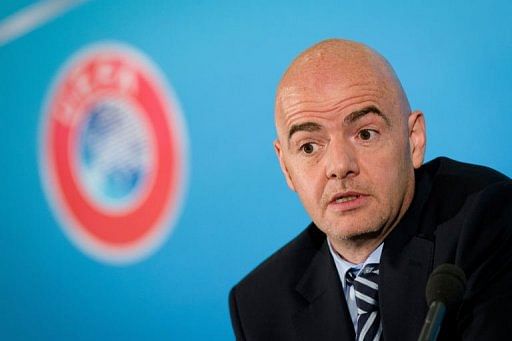 Gianni Infantino speaks to members of the media during a press conference in central London on May 23, 2013