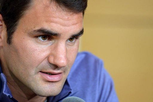 Federer takes delayed flight to Twitter
