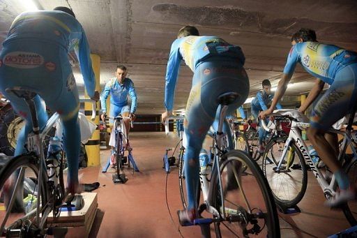 Italian cyclist Vincenzo Nibali and his colleagues train at a hotel following the cancellation of the 19th stage