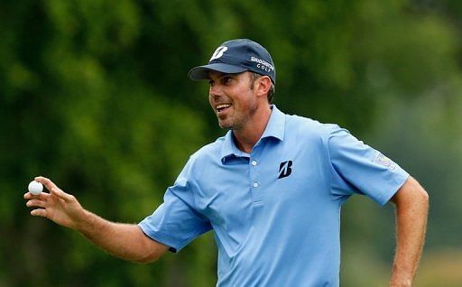 Matt Kuchar celebrates a birdie putt on the seventh green at Colonial at Colonia Country Club on May 24, 2013