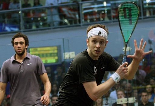 James Willstrop plays against Egypt&#039;s Ramy Ashour during the World Cup Squash final in Chennai on March 12, 2011