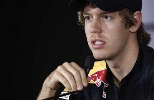 Red Bull&#039;s German driver Sebastian Vettel speaks during a news conference in Abu Dhabi on November 11, 2010
