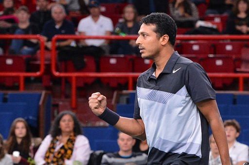 India&#039;s Mahesh Bhupathi celebrates after a point on November 4, 2012 at the Bercy Palais-Omnisport in Paris