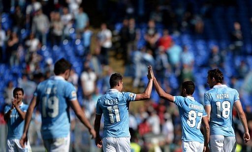 Lazio players celebrate after scoring against  Sampdoria during the match in Rome&#039;s Olympic Stadium on May 12, 2013