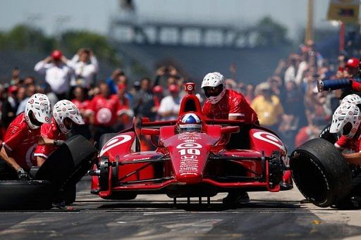 Dario Franchitti of Scotland, stops during the pit crew challenge for the Indianapolis 500 mile race on May 24, 2013