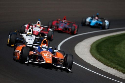 Charlie Kimball leads a pack  during final practice on May 24, 2013 for the 97th Indianapolis 500 mile race, in Indiana