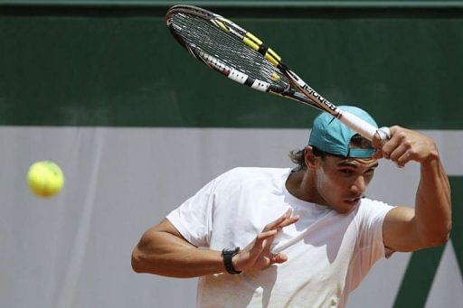 Spain&#039;s Rafael Nadal trains on the eve of the French Open at the Roland Garros stadium in Paris, on May 25,  2013