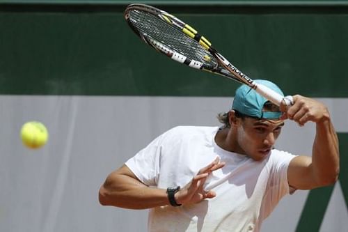 Spain's Rafael Nadal trains on the eve of the French Open at the Roland Garros stadium in Paris, on May 25,  2013