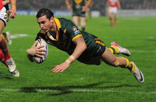 Australia&#039;s Darius Boyd scores a try on November 13, 2011 during a Four Nations rugby league test in Wrexham, Wales