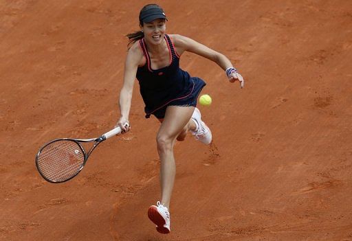 Serbia&#039;s Ana Ivanovic during a French tennis Open first round match on May 26, 2013 at the Roland Garros stadium, Paris