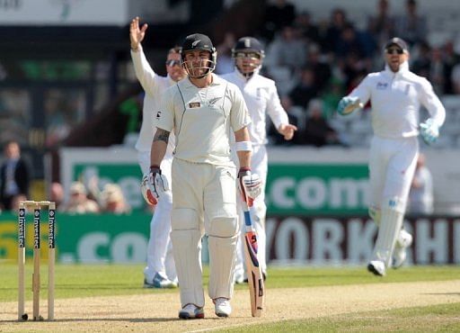 Doug Bracewell walks after being caught by England&#039;s Ian Bell off Graeme Swann&#039;s bowling in Leeds on May 26, 2013