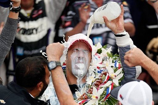 Tony Kanaan celebrates with the victory milk on May 26, 2013 in Indianapolis