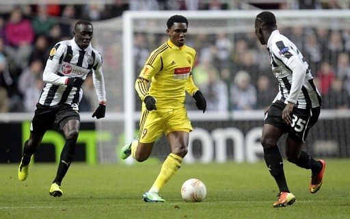 Anzhi&#039;s Samuel Eto&#039;o (centre) in action against Newcastle United during their UEFA Europa League match on March 14, 2013