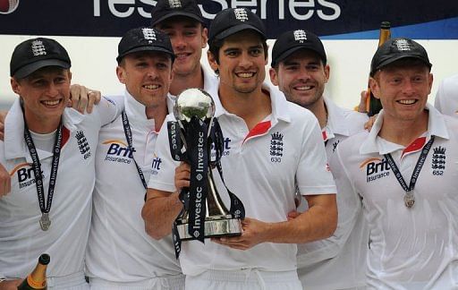 England&#039;s Alastair Cook (C) with teammates as England celebrates a series win vs New Zealand in Leeds on May 28, 2013