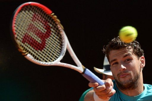 Bulgaria&#039;s Grigor Dimitrov returns the ball to France&#039;s Richard Gasquet during the Italian Open in Rome, on May 14, 2013