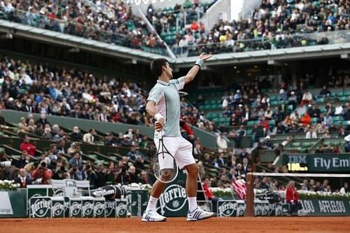 Serbia's Novak Djokovic serves to Belgium's David Goffin at the Roland Garros stadium in Paris on May 28, 2013