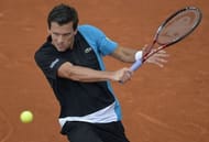 Germany's Tobias Kamke hits a shot to France's Julien Benneteau at the French Open in Paris, on May 29, 2013