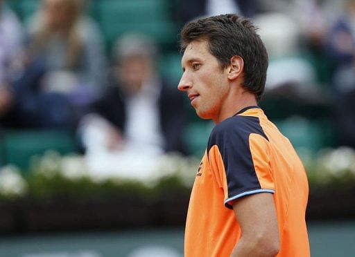 Ukraine&#039;s Sergiy Stakhovsky looks on after a point on May 27, 2013 at the Roland Garros stadium in Paris