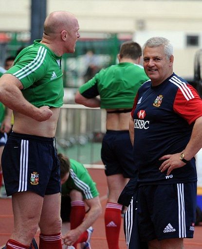 British and Irish Lions player Paul O&#039;Connell (L) talks to Wales coach Warren Gatland in Hong Kong on May 29, 2013